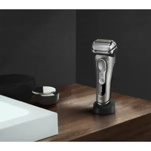 Braun Series 9 PRO+ 9515s electric shaver with a charging stand